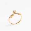 Anillo dorado de acero inoxidable con zirconias