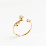 Anillo dorado de acero inoxidable con zirconias