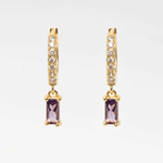 Arete dorado de acero inoxidable con zirconia morada
