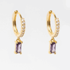 Arete dorado de acero inoxidable con zirconia morada