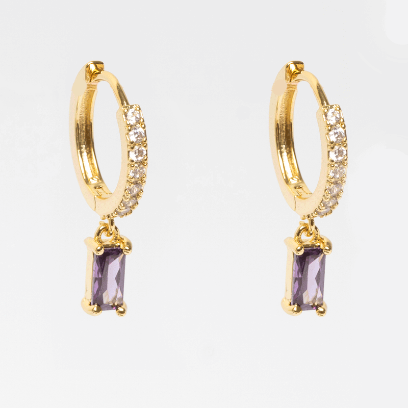 Arete dorado de acero inoxidable con zirconia morada