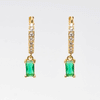 Arete dorado de acero inoxidable con zirconia verde