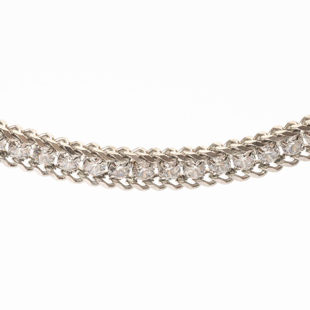 Pulsera dorada de acero inoxidable con zirconias