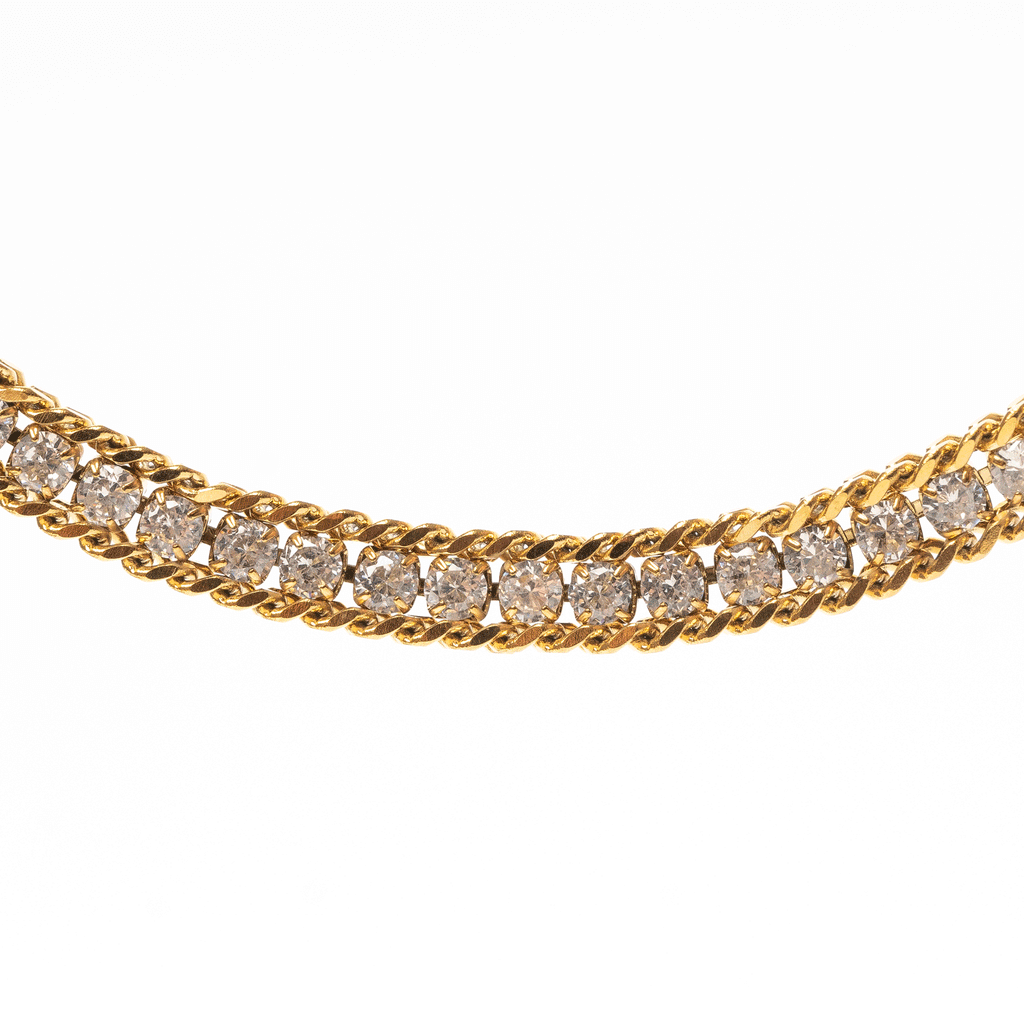 Pulsera dorada de acero inoxidable con zirconias