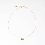 Collar dorado de acero inoxidable con zirconias verdes