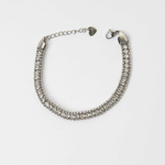 Pulsera plateada de acero inoxidable con zirconias