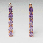 Arracada de acero inoxidable y zirconia morada