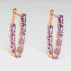 Arracada de acero inoxidable y zirconia morada