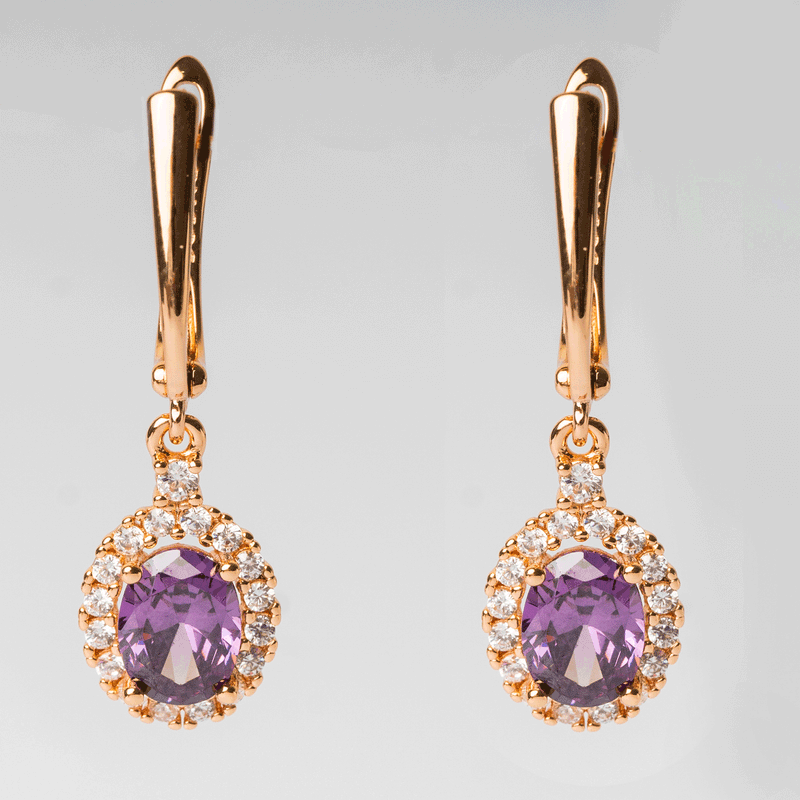 Arete de acero inoxidable con zirconias moradas y blancas