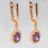 Arete de acero inoxidable con zirconias moradas y blancas