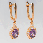 Arete de acero inoxidable con zirconias moradas y blancas
