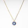 Collar dorado con dije en forma de ojo en color azul
