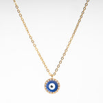 Collar dorado con dije en forma de ojo en color azul