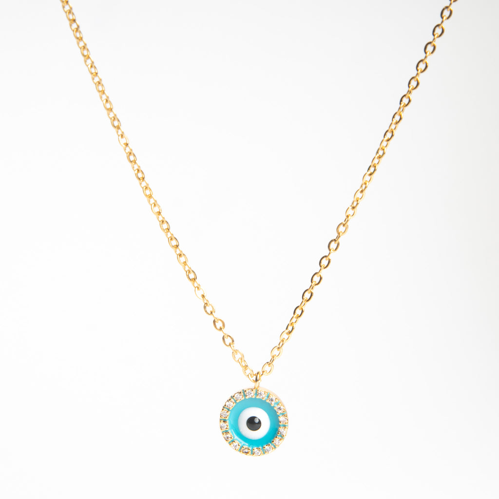 Collar dorado con dije en forma de ojo en color azul