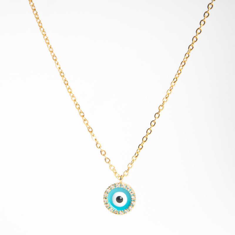 Collar dorado con dije en forma de ojo en color aqua