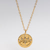 Collar de acero inoxidable con chapa de oro de 18 quilates con dije en forma de ojo