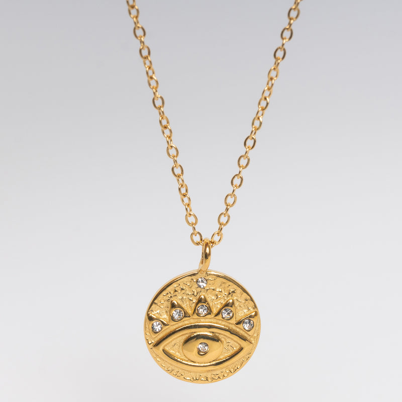 Collar de acero inoxidable con chapa de oro de 18 quilates con dije en forma de ojo