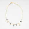 Eleva tú look de manera sutil esta primavera con el colorido collar Galaxy Charms.  Un collar perfecto para un evento de día como un brunch, bautizo, o primera comunión. Este collar también es una buena opción para elevar un look más casual.