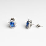Aretes plateados con cristal azul