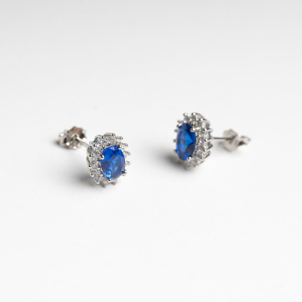 Aretes plateados con cristal azul