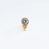 piercing de acero inoxidable con una zirconia circular
