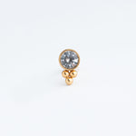 piercing de acero inoxidable con una zirconia circular