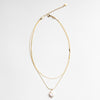 Collar Doble de Acero Inoxidable con Chapa de Oro en color dorado con dije de perla de rio