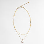 Collar Doble de Acero Inoxidable con Chapa de Oro en color dorado con dije de perla de rio