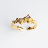 Anillo dorado de plata con acabado mate y zirconias de dos colores
