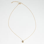 Collar dorado de plata con dije en forma de esfera