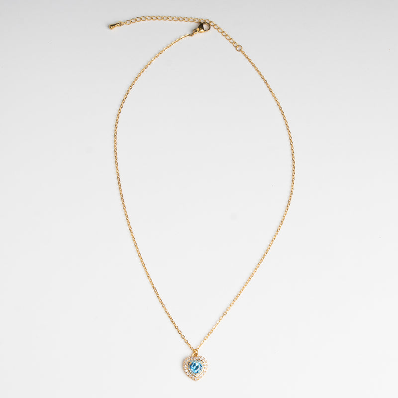 Collar dorado en chapa de oro con dije en forma de corazón en color azul