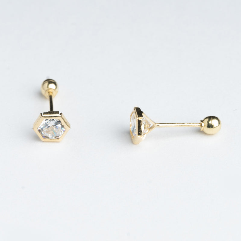 aretes de oro en forma hexagonal