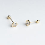 aretes de oro en forma hexagonal