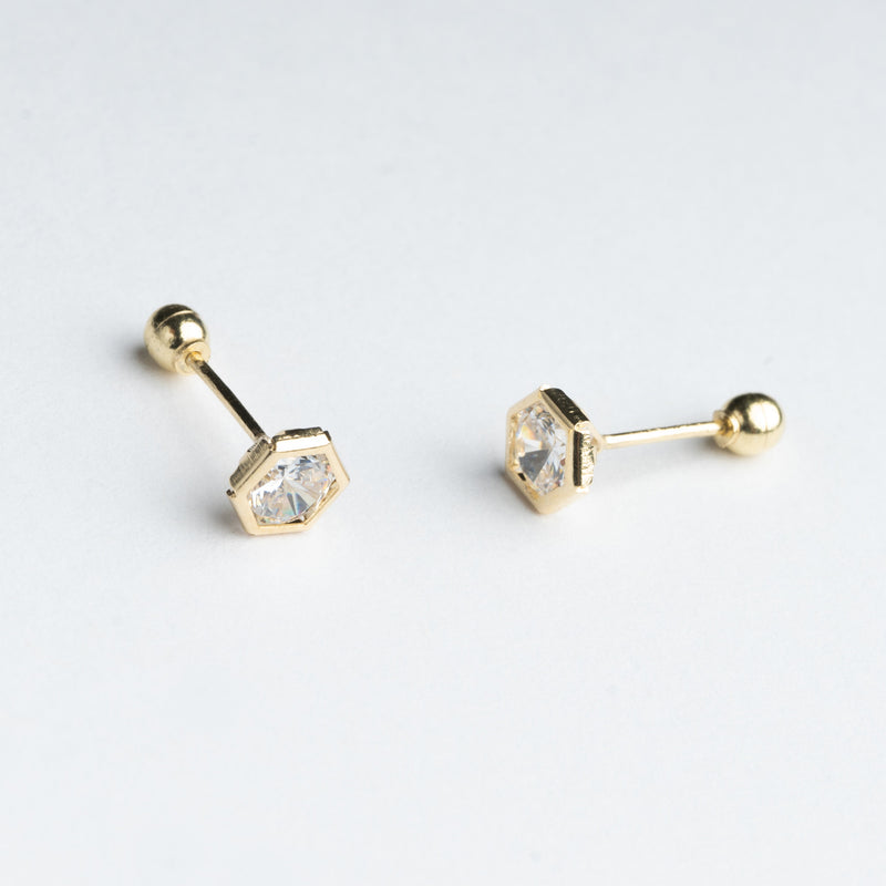 aretes de oro en forma hexagonal