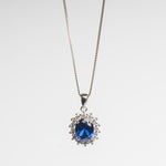 Collar de Plata en color plateado con dije en forma ovalada con Zirconia azul