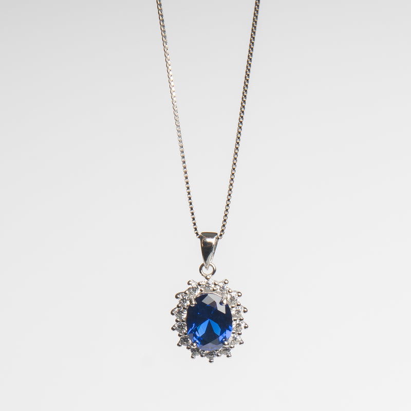 Collar de Plata en color plateado con dije en forma ovalada con Zirconia azul