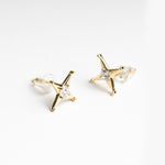 Aretes de Plata en color dorado en forma de estrellas de 4 puntas