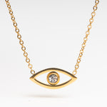 Collar de acero inoxidable con chapa de oro en color dorado y dije en forma de ojito