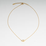 Collar de acero inoxidable con chapa de oro en color dorado y dije en forma de ojito