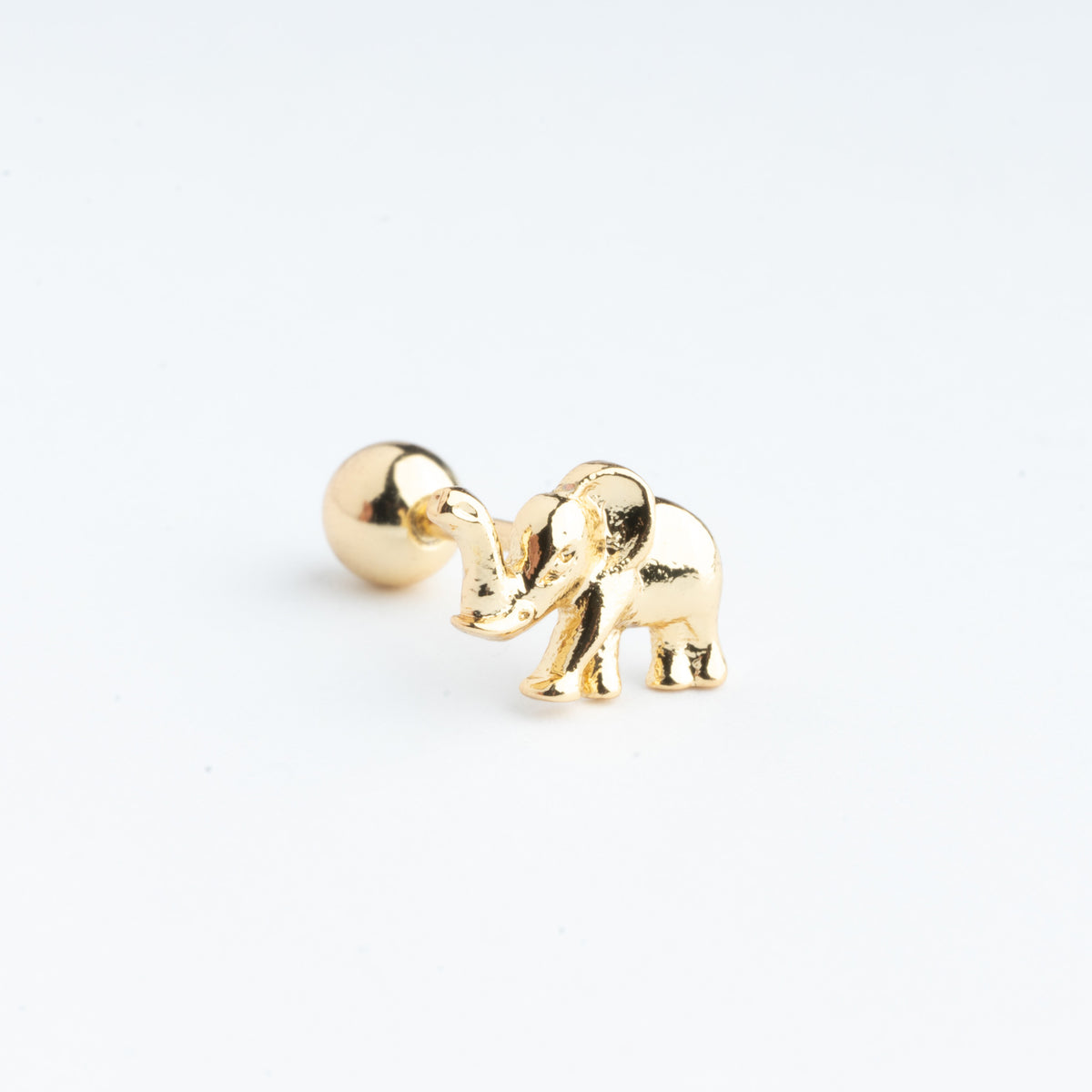 Piercing en forma de elefante color dorado