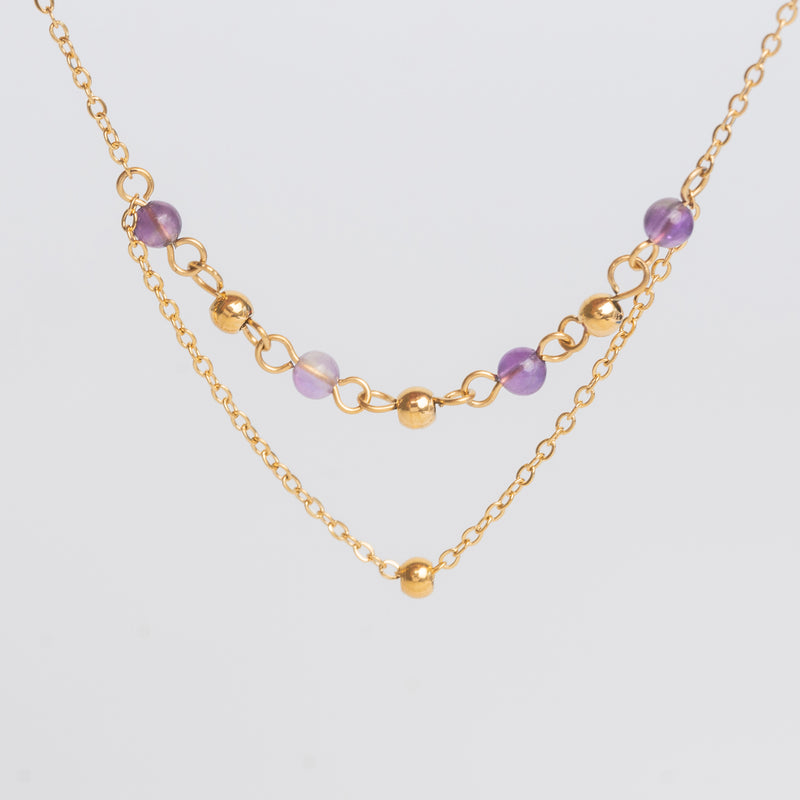 collar de acero inoxidable en color dorado con cadena doble