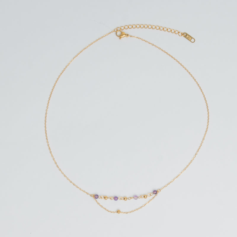 collar de acero inoxidable en color dorado con cadena doble